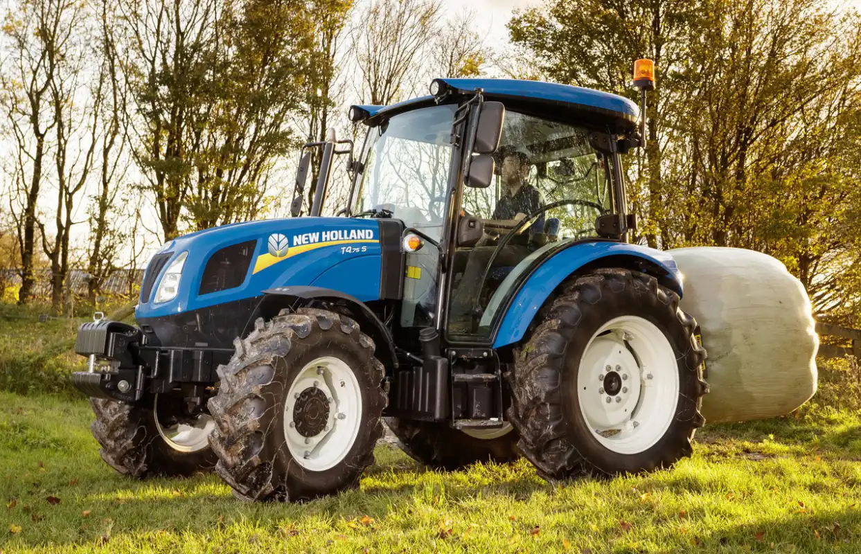 Холанд трактор. Трактор Нью Холланд. Трактор New Holland t4.95f. New Holland t6050. Т8040 New Holland.